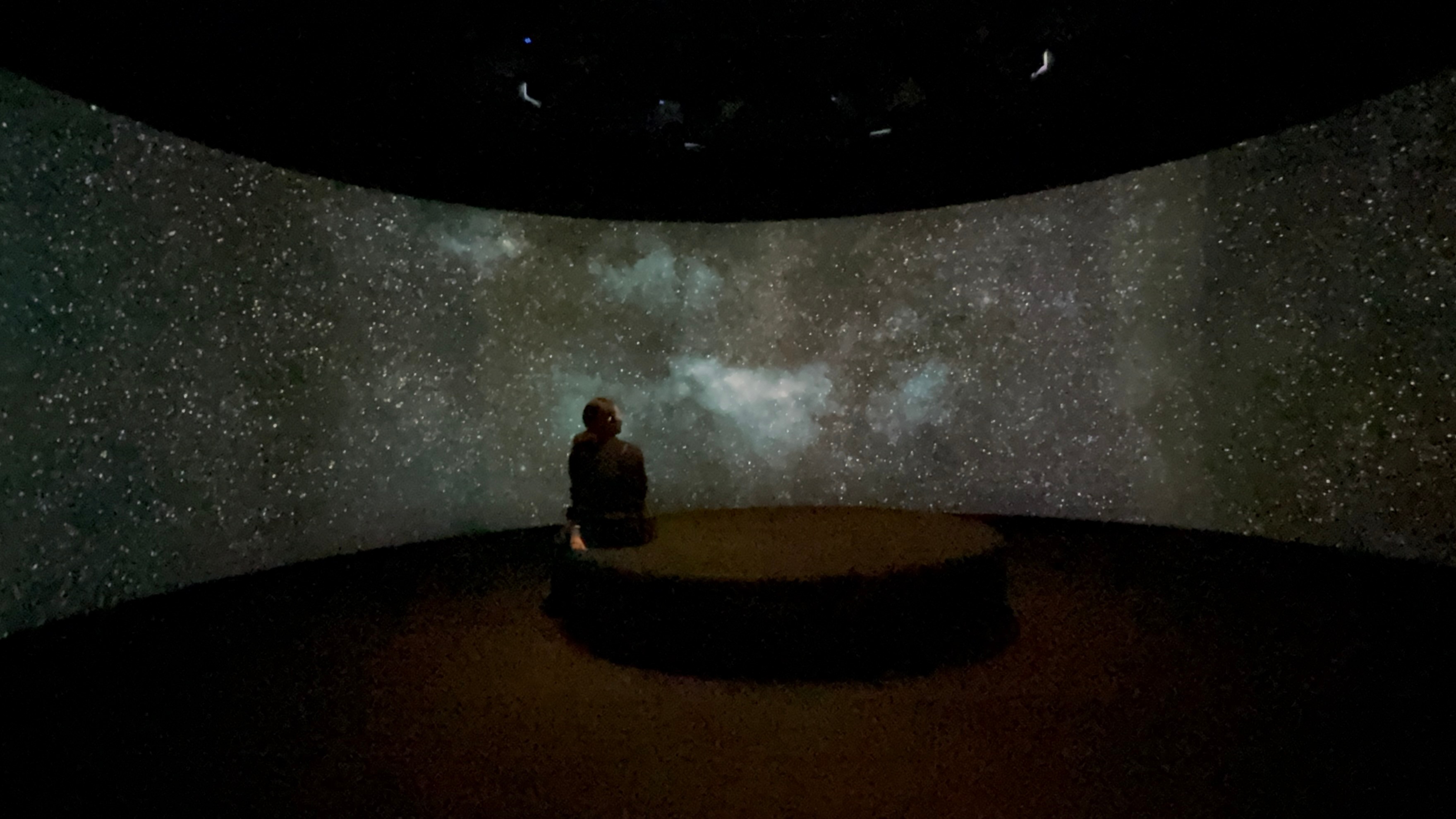 painting of two people on a beach